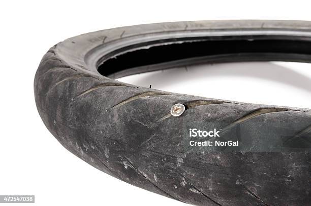 Damage Tire Stock Photo - Download Image Now - Flat Tire, Motorcycle, 2015