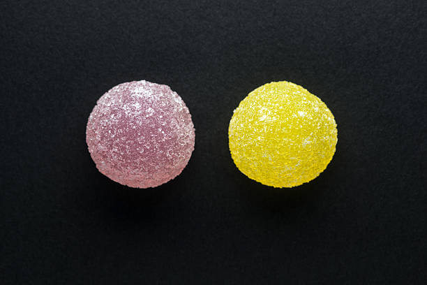 Purple gumball on white