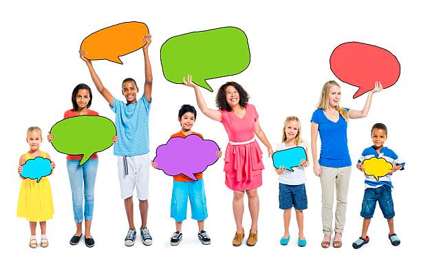 istock Casual People Holding Colorful Speech Bubbles 472552814