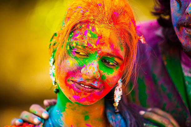 istock Indian woman at Holi 472555348