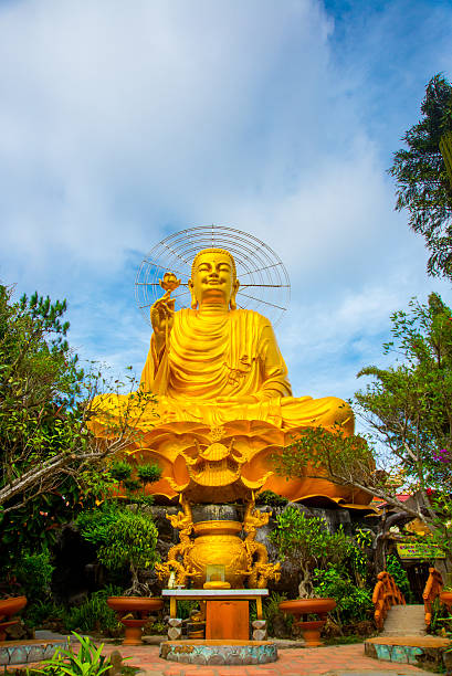 istock Religious monument, seated gold Buddha 472556180