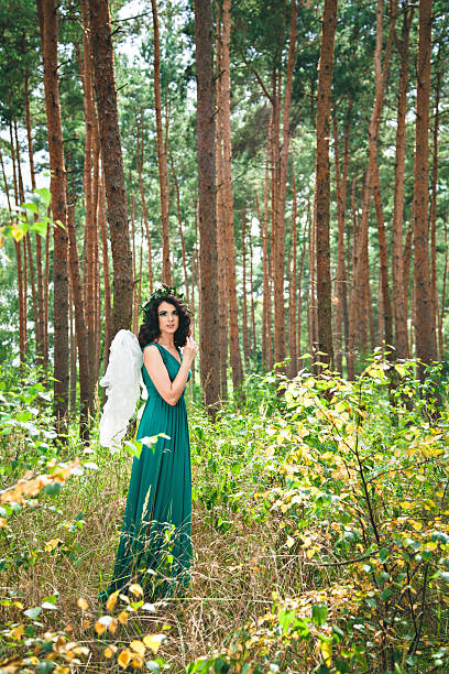 istock Pretty girl with angel wings 472557540
