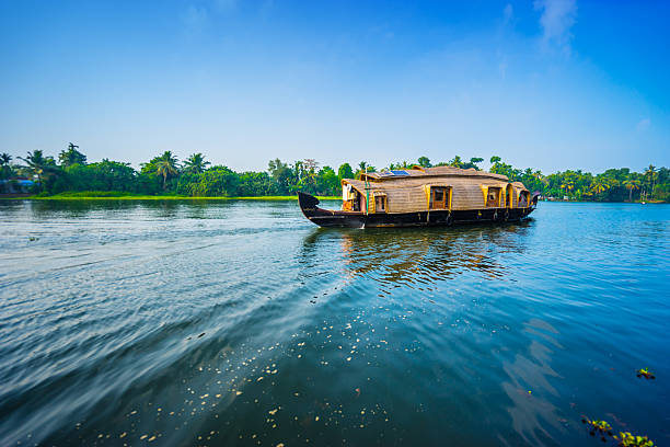 Houseboat in southern India Houseboat on Kerala backwaters - India kerala south india stock pictures, royalty-free photos & images