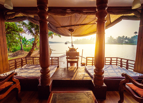 Houseboat on Kerala backwaters early in the morning - India