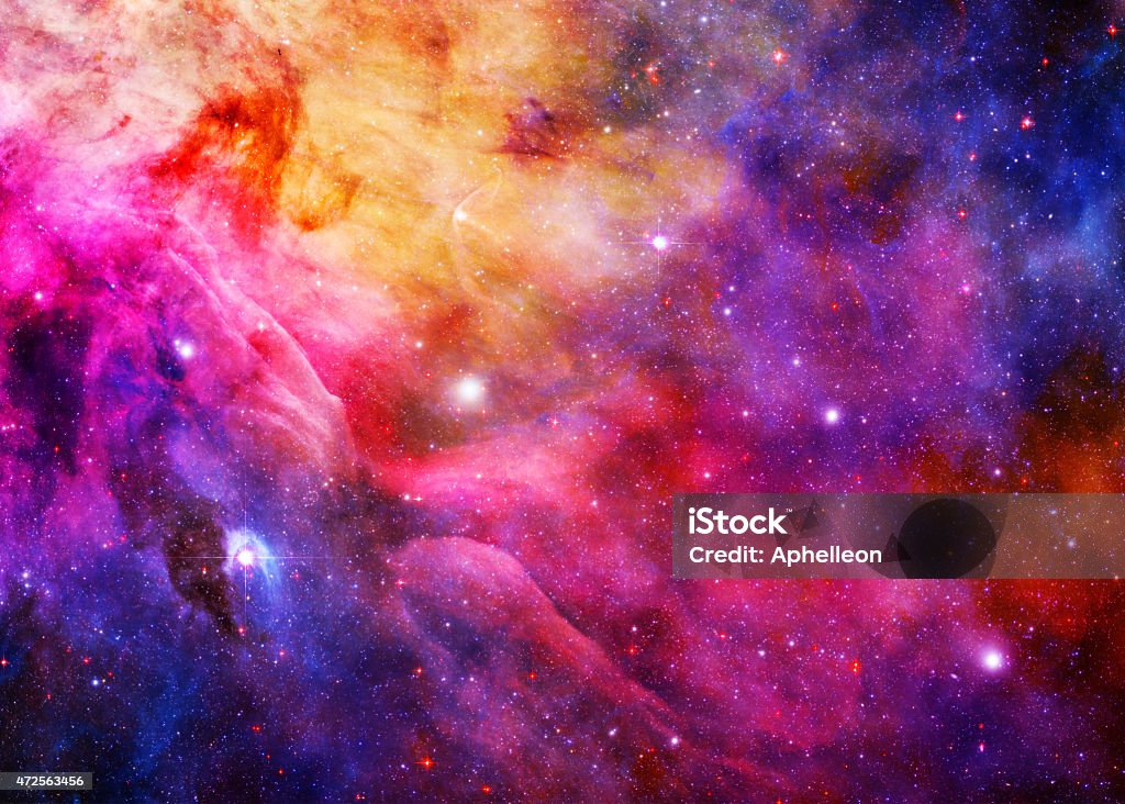 Starry Galaxy - Elements of this Image Furnished by NASA A galaxy thrums and churns, glowing brilliantly from the darkness of space. Galaxy Stock Photo