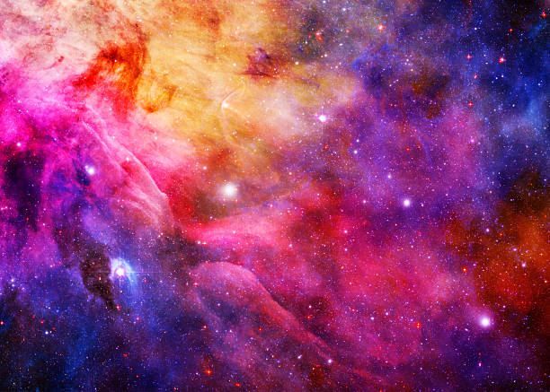 Starry Galaxy - Elements of this Image Furnished by NASA A galaxy thrums and churns, glowing brilliantly from the darkness of space. nebula stock pictures, royalty-free photos & images