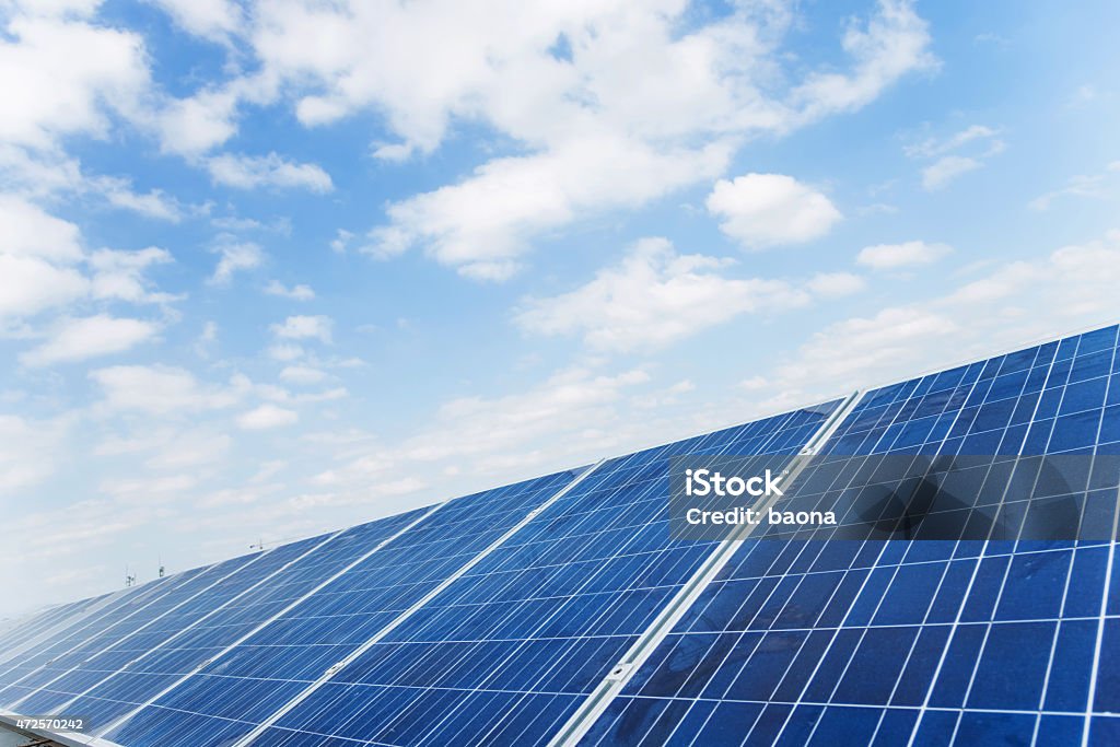 solar panels Group of solar panels against blue sky. 2015 Stock Photo