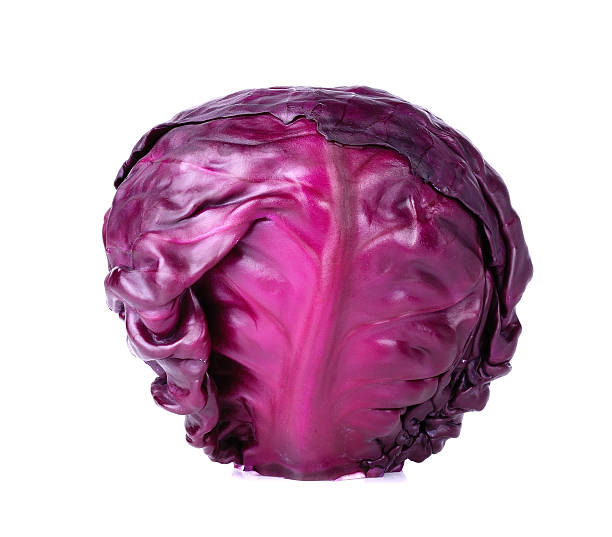 istock Fresh Purple cauliflower isolated on white background 472572880