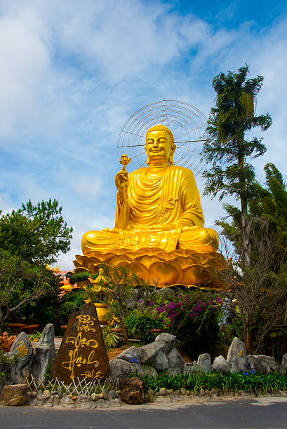istock Religious monument, seated gold Buddha 472572998