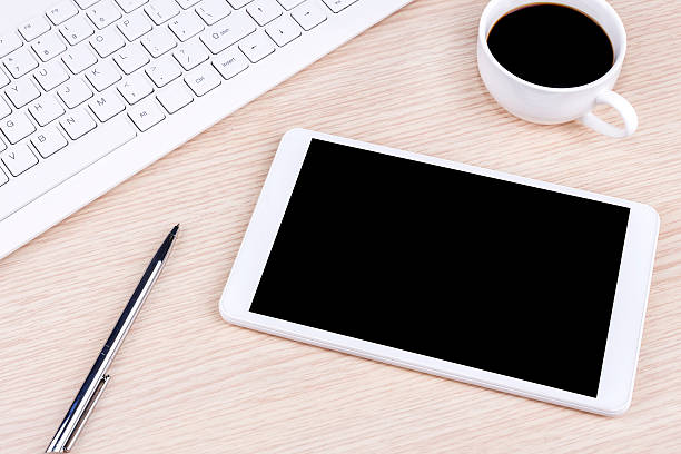 istock Bussiness growth:digital tablet and keyboard with coffee on desk 472578874