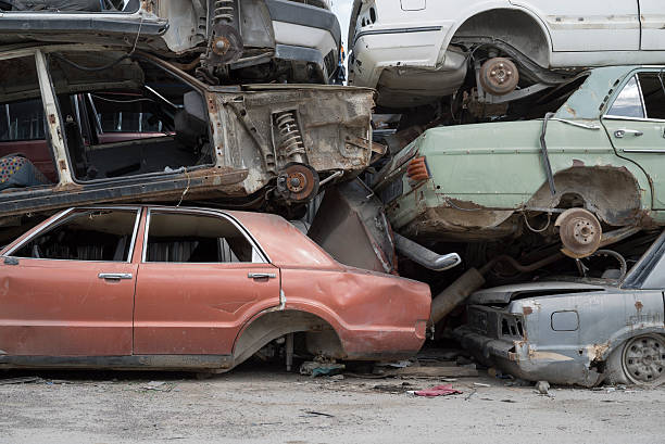 istock Wrecked Cars Stored at a Junkyard 472579318