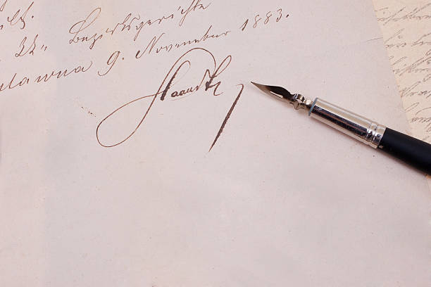 istock background with retro ink pen on old aged handwriteln letter 472580104