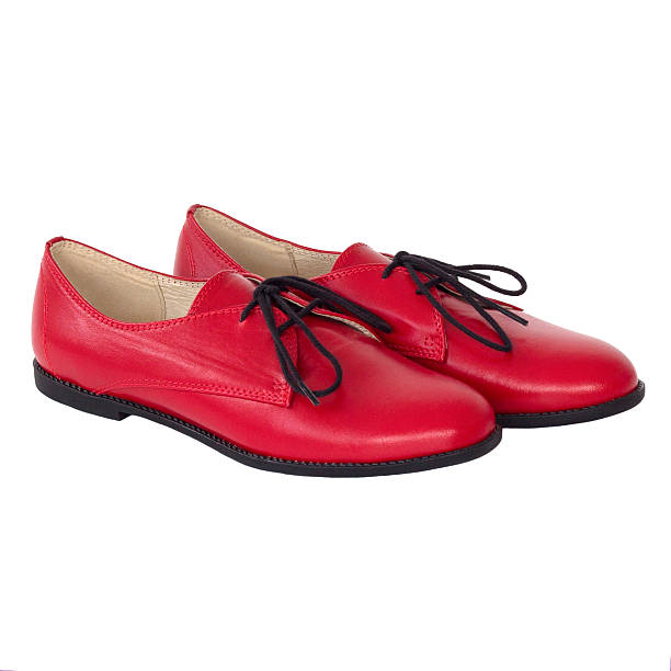 istock Isolated red Oxford shoe on a white background 472581368