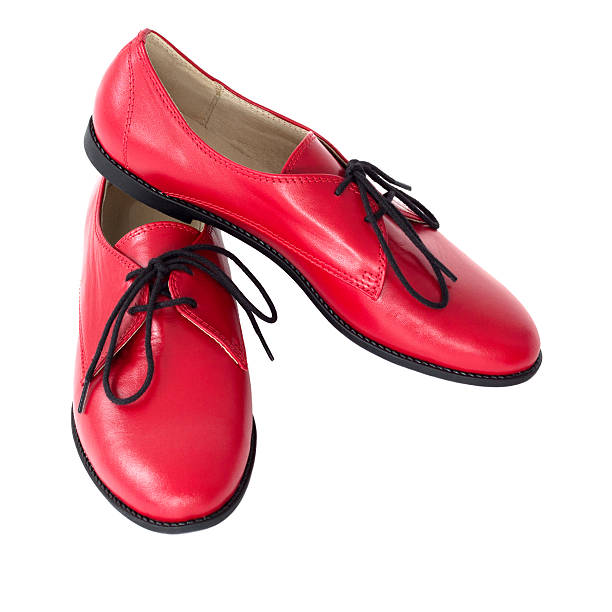 istock Isolated red Oxford shoe on a white background 472581412