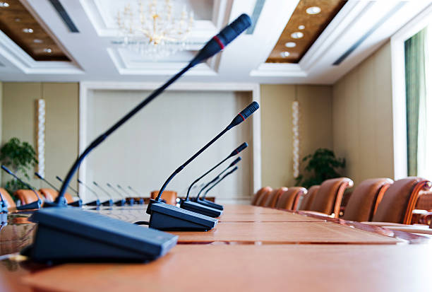 conference table - conference call convention center presentation podium stock-fotos und bilder