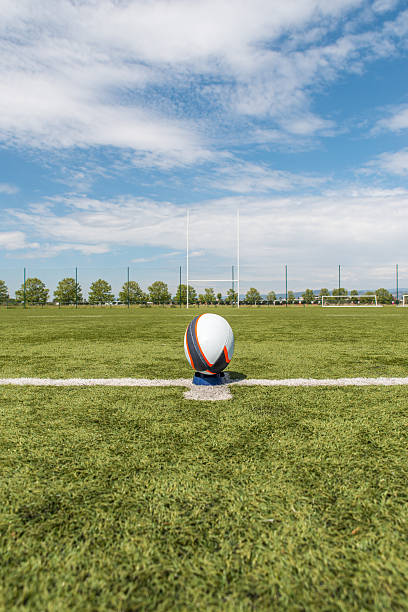 istock rugby ball on the field, ready to score. 472587418