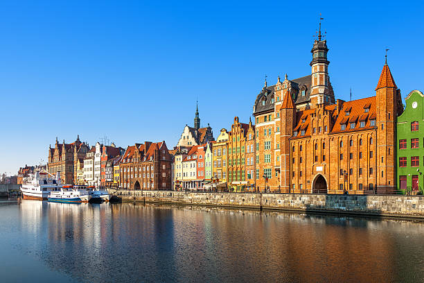 Old Town in Gdansk View of the riverside on Old Town by the Motlawa river in early morning light. Gdansk, Poland. gdansk stock pictures, royalty-free photos & images