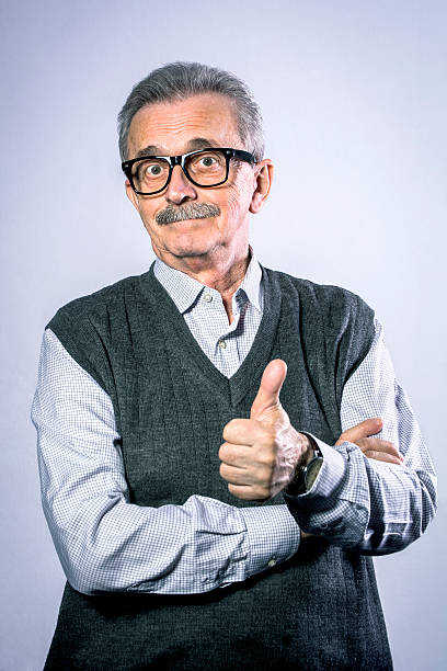 istock Old man showing thumbs up 472588624