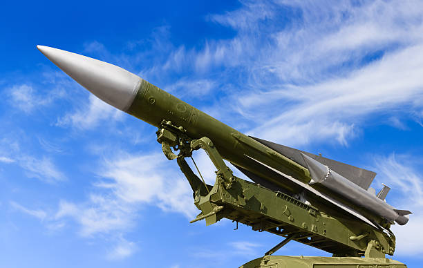 istock Anti-aircraft defence system on sky background 472588742