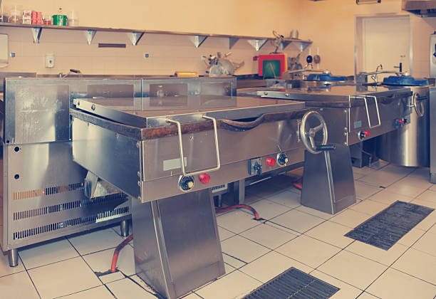 istock Typical kitchen of a restaurant, toned 472594028