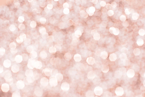 istock pink abstract glitter bokeh lights. defocused lights background. 472594314