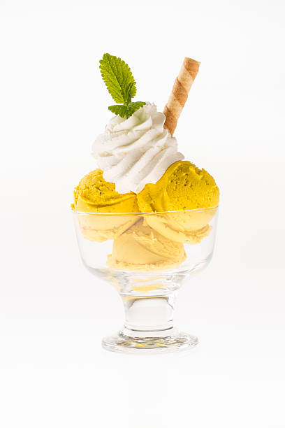 istock sundae with whipping cream on the bright background 472594396