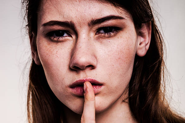 istock Shhhhh Woman! Finger On Lips. Silent - Silence Stock Image 472595714