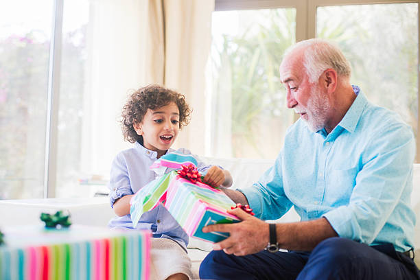 istock Three generation family celebrating a birthday in Dubai. 472597080