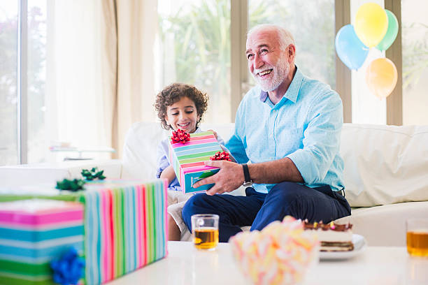 istock Three generation family celebrating a birthday in Dubai. 472597082