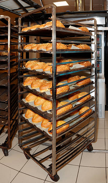 istock Steel rack with bread, commercial kitchen 472597742