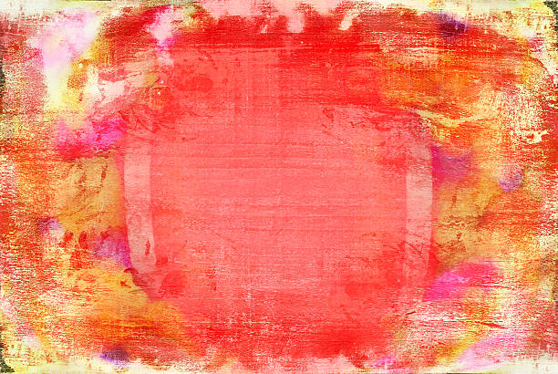 istock red yellow textured wooden blurred background 472602174