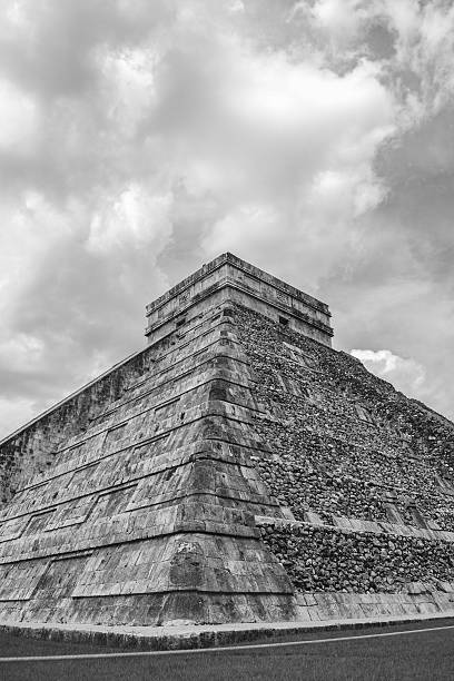 a side view of the castillo of chichen itza in mexico