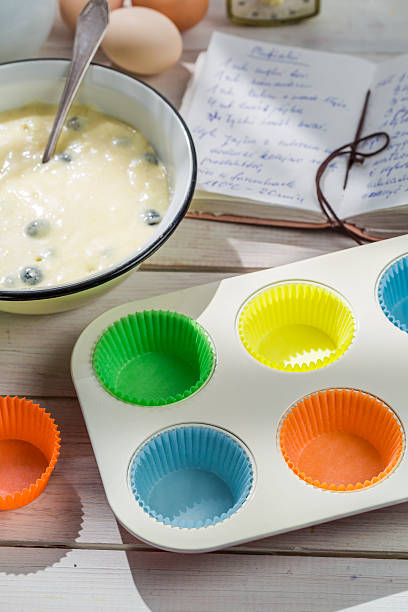 istock Baking fresh cupcakes with berry fruits 472604650