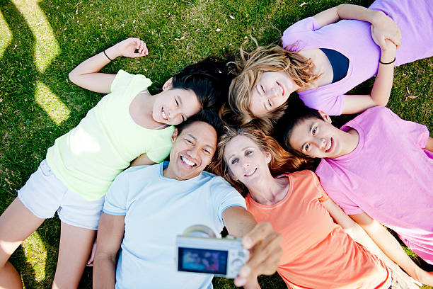 istock Family Selfie at the Park 472605232