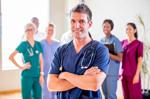 istock Medical Professionals Standing in a Group 472605236