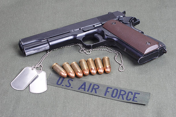 istock background with colt government m1911 472611150