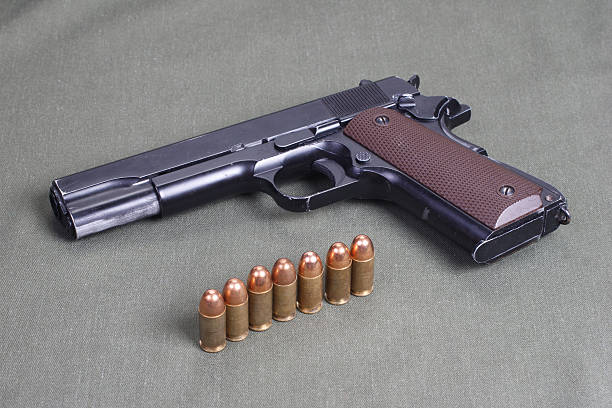 istock background with colt government m1911 472611168