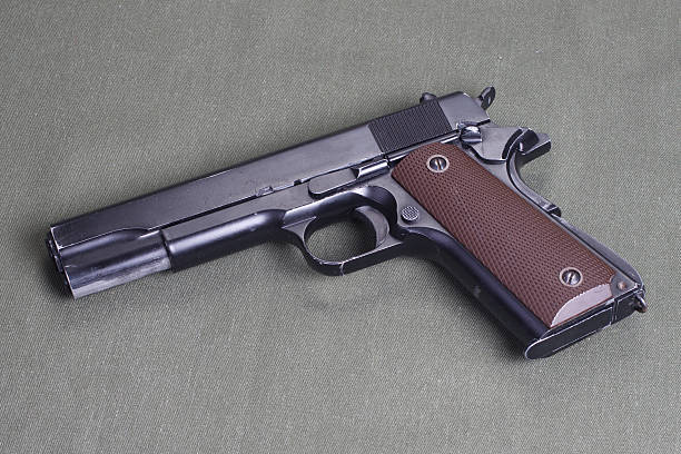 istock background with colt government m1911 472611198