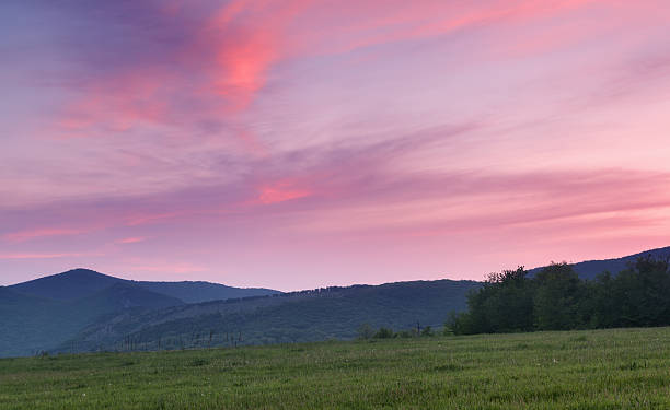 istock Beautiful landscape. Sunset in the mountains in summer. Twilight 472612112