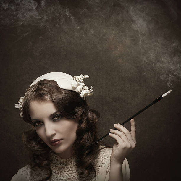 istock retro young woman smoking 472616466
