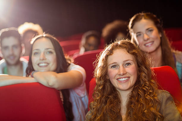 istock Young friends watching a film 472617266