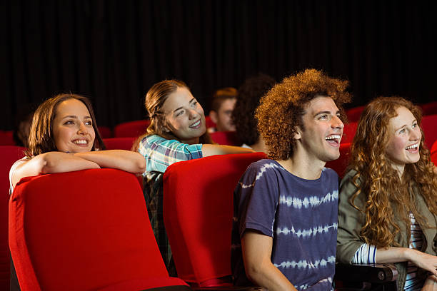 istock Young friends watching a film 472617306