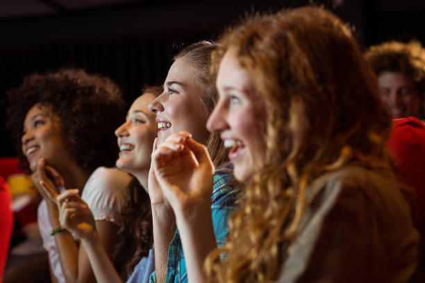 istock Young friends watching a film 472617534