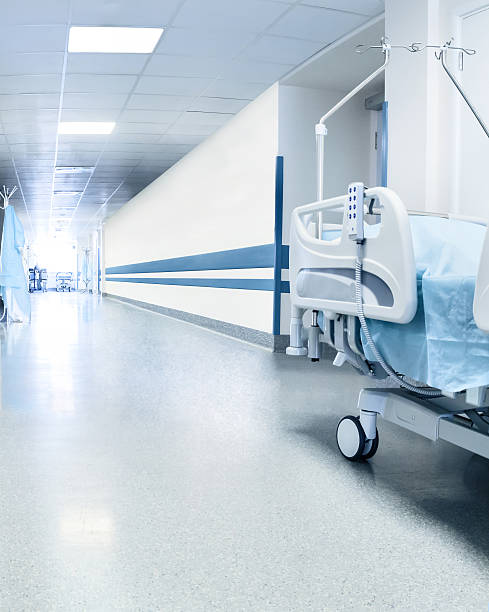 istock Surgical bed in hospital's corridor near operation room. 472619984
