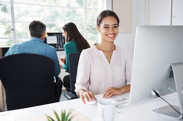 istock Focusing on her career with a smile 472621056