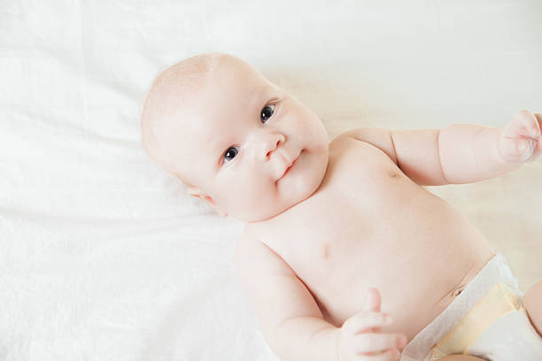 istock Cute Newborn Baby Lying on Back 472629942