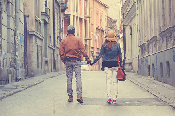 istock Couple enjoying outdoors in a urban surroundings. 472630568