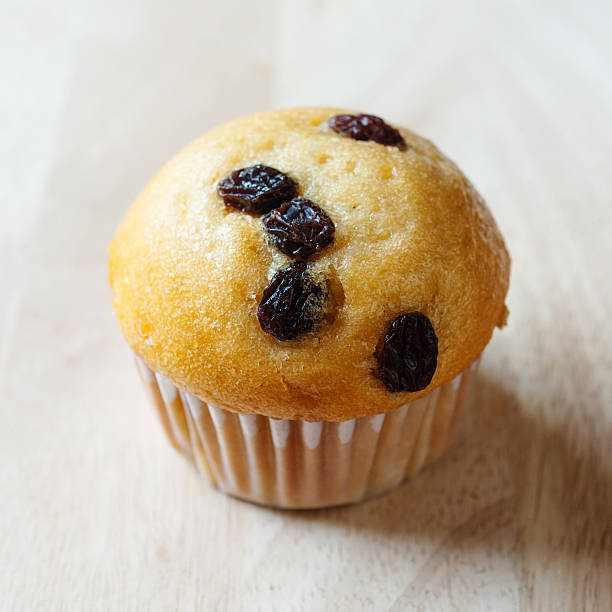 istock Closeup of Cupcake on wooden 472633662