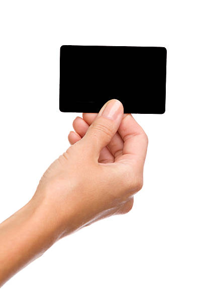 istock A black card in a woman's hand 472634518
