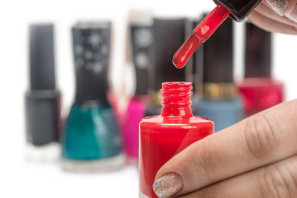 istock nail polish and female hands 472639662